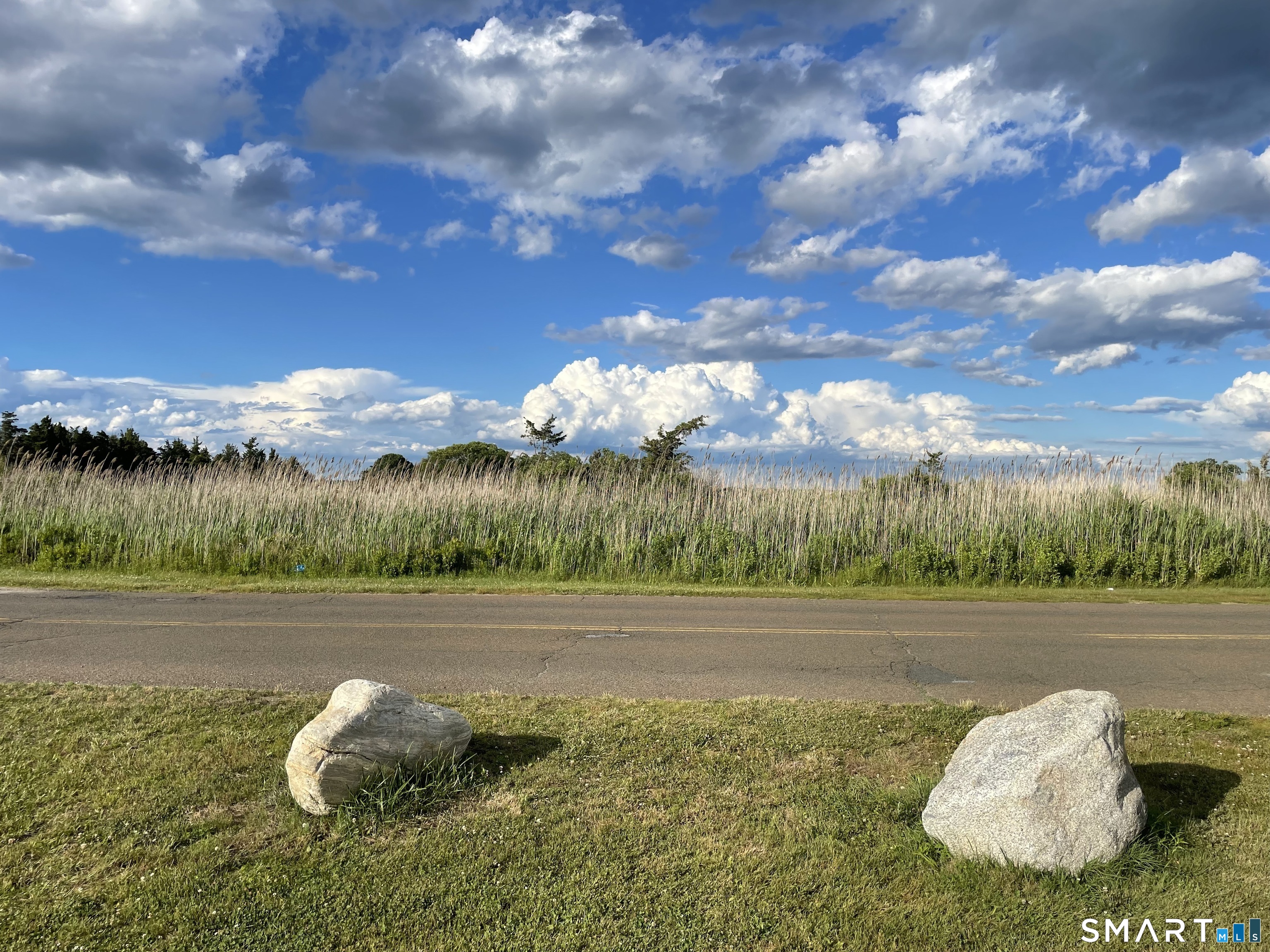 1023 Boston Post Road Madison, CT 06443 - Photo 19 of 38 Gorgeous clouds at Hammonasset Beach State Park.