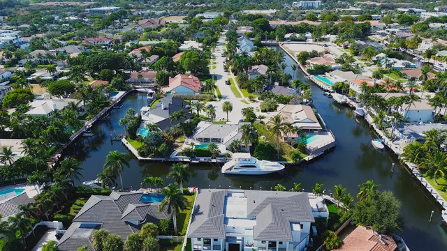 an aerial view of a house with outdoor space