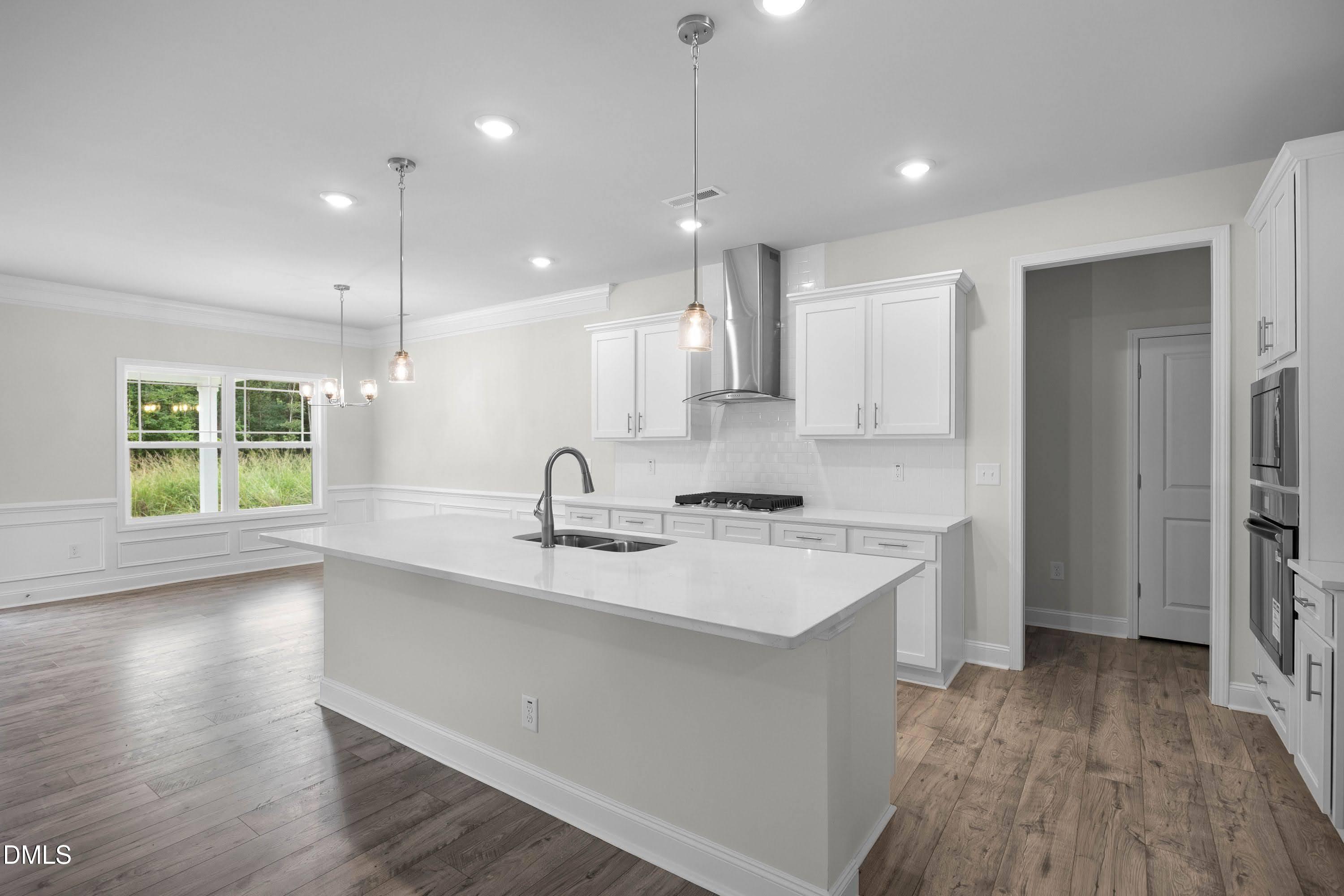 88 Galway Road Lillington, NC 27546 - Photo 15 of 36 a large kitchen with a lot of counter space