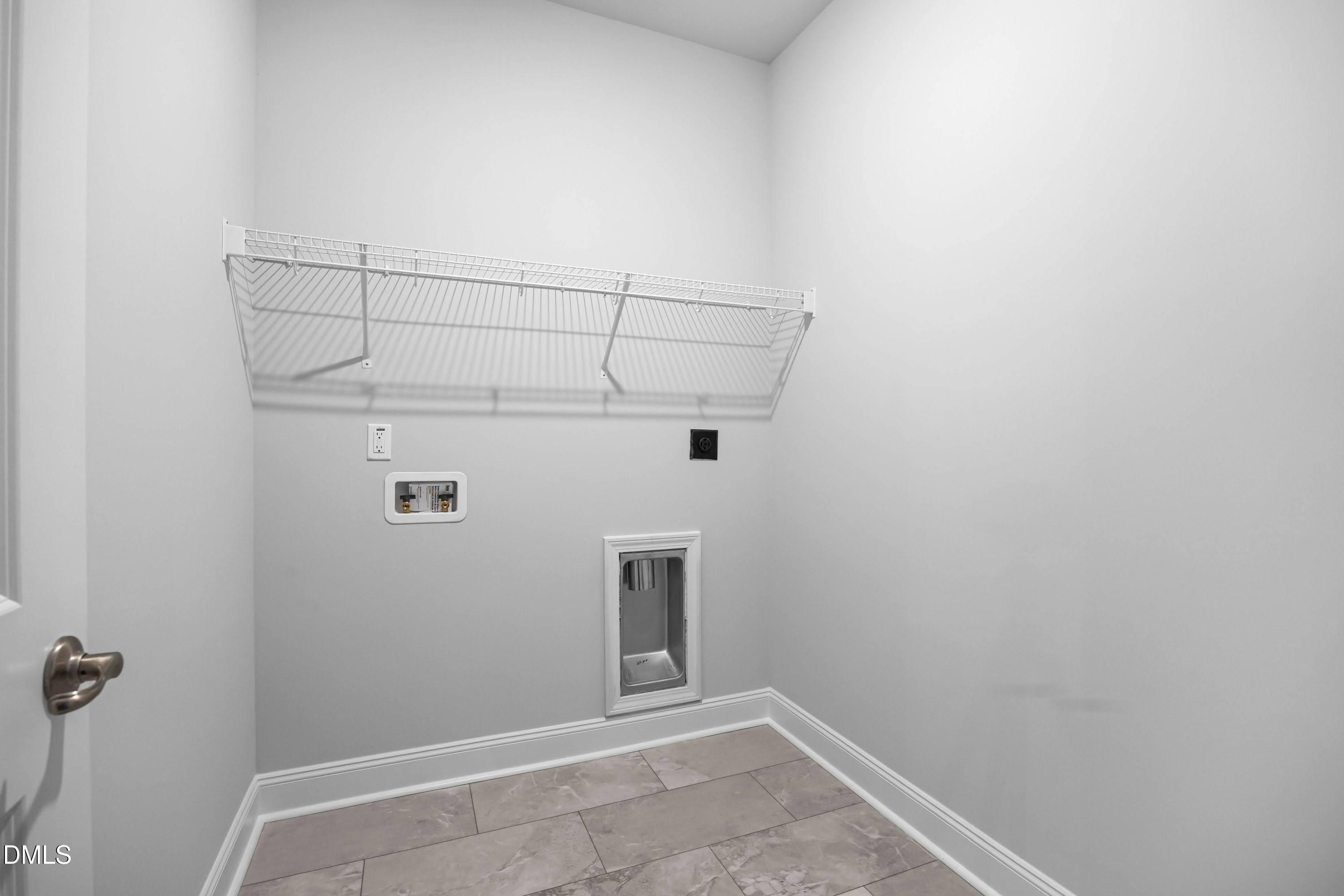 88 Galway Road Lillington, NC 27546 - Photo 17 of 36 a view of a refrigerator in kitchen