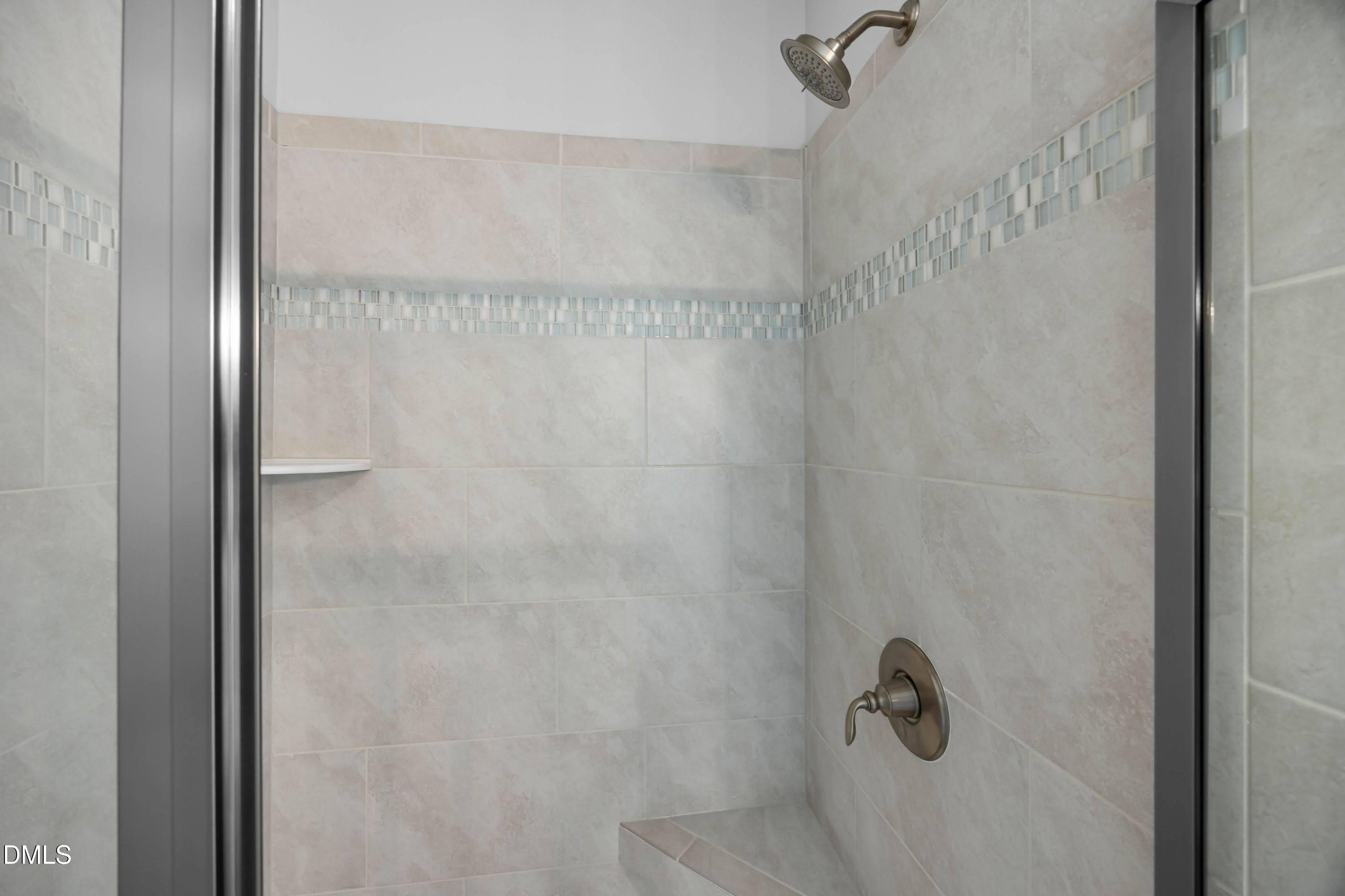 88 Galway Road Lillington, NC 27546 - Photo 23 of 36 a bathroom with a shower