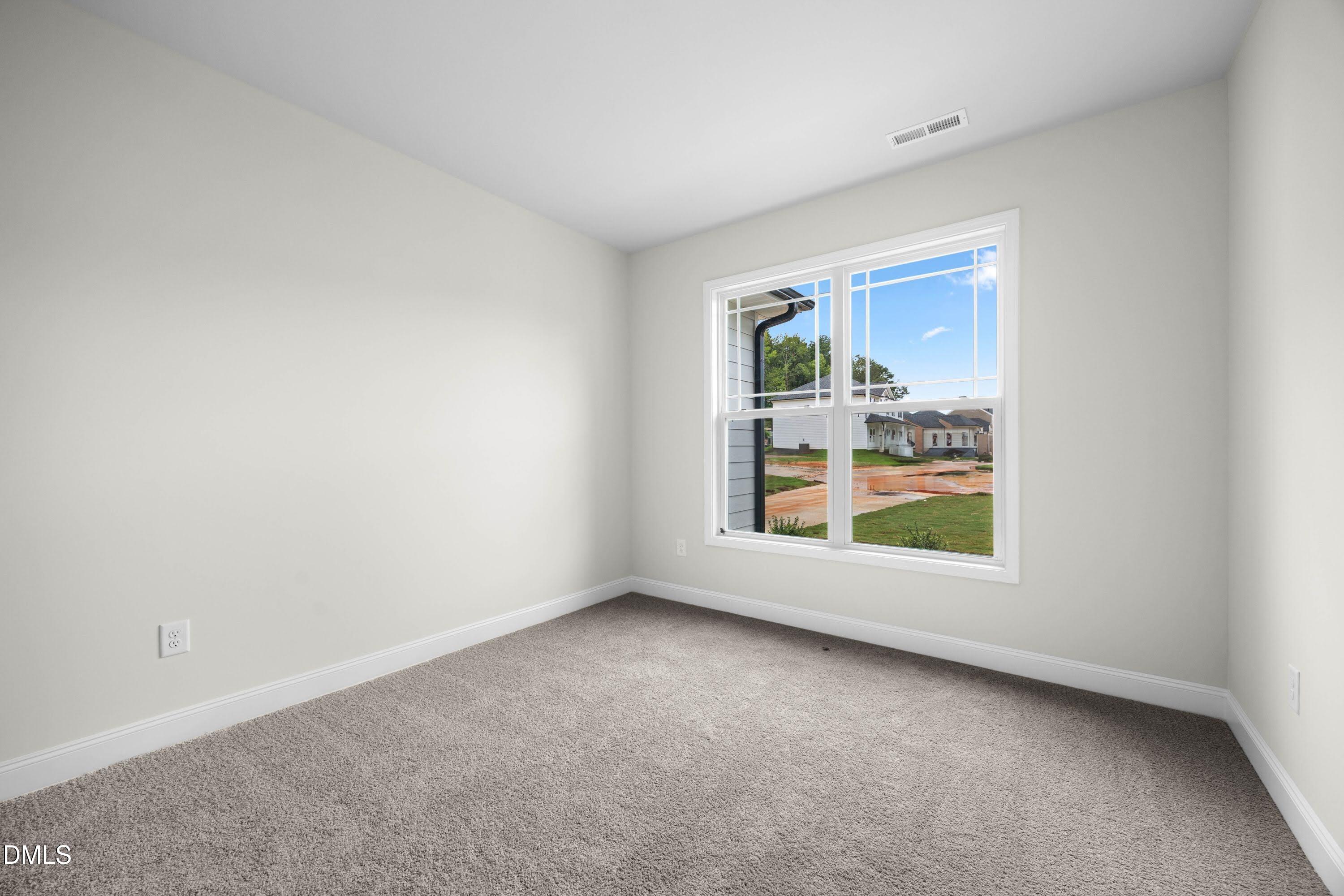 88 Galway Road Lillington, NC 27546 - Photo 28 of 36 a view of a room that has a window in it