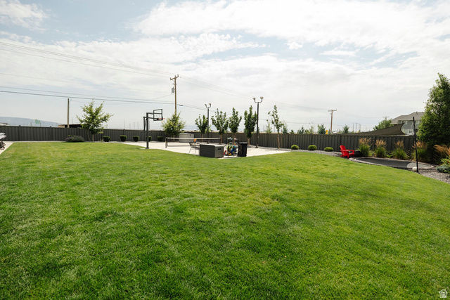924 Country Lane Farmington, UT 84025 - Photo 74 of 91 Expansive green lawn with a perimeter fence