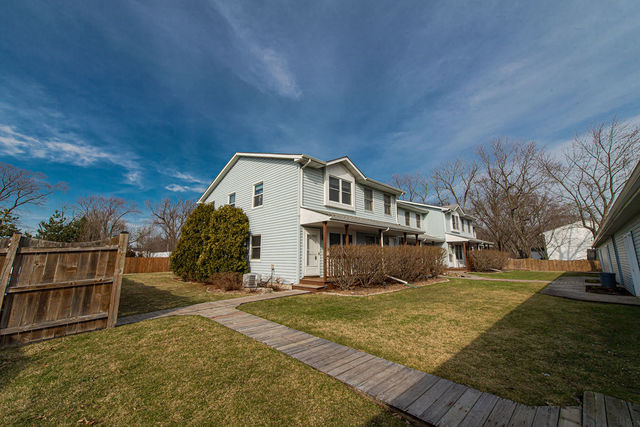 25696 Raska Lane, Unit A Lake Villa, IL 60046 - Photo 2 of 31 a view of a house with a yard
