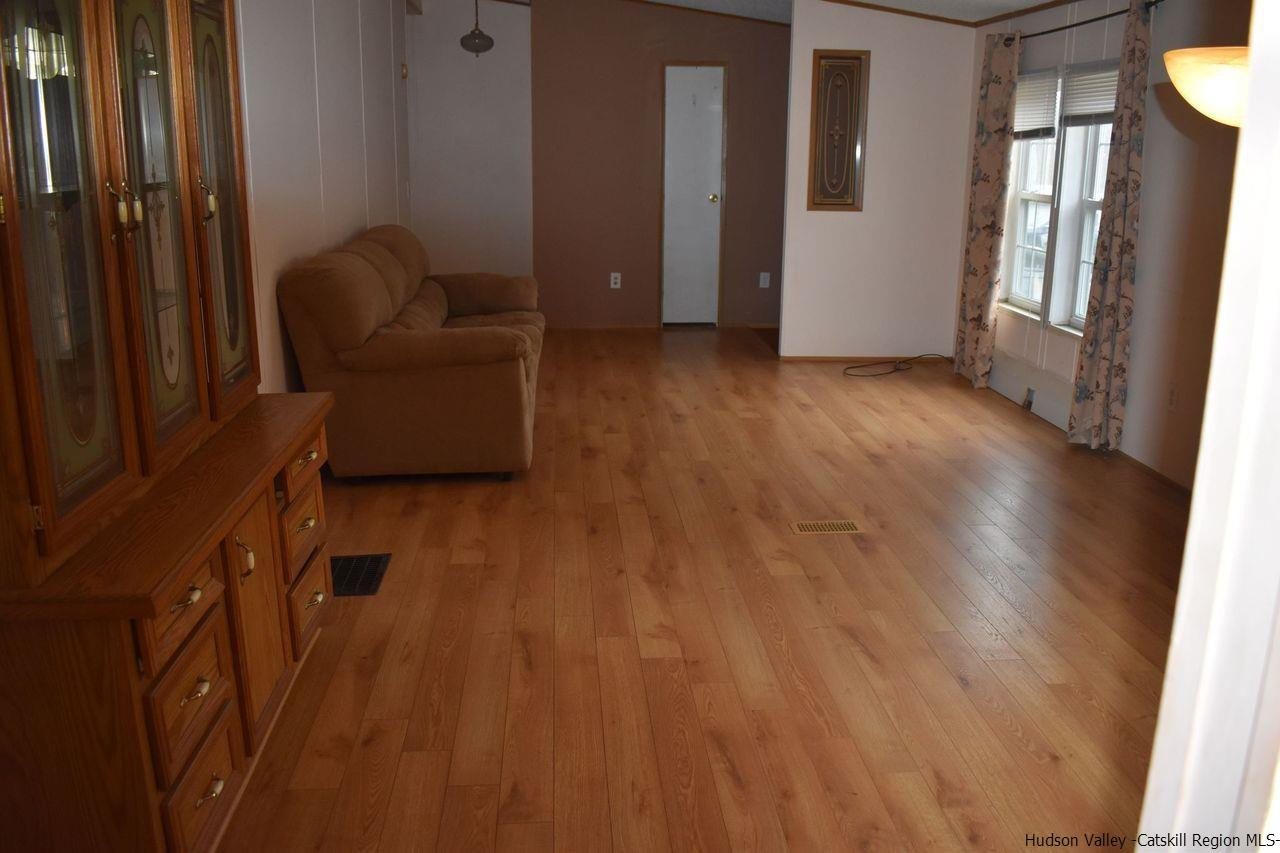 34 Depew Park Wallkill, NY 12589 - Photo 8 of 14 a view of livingroom with furniture and staircase