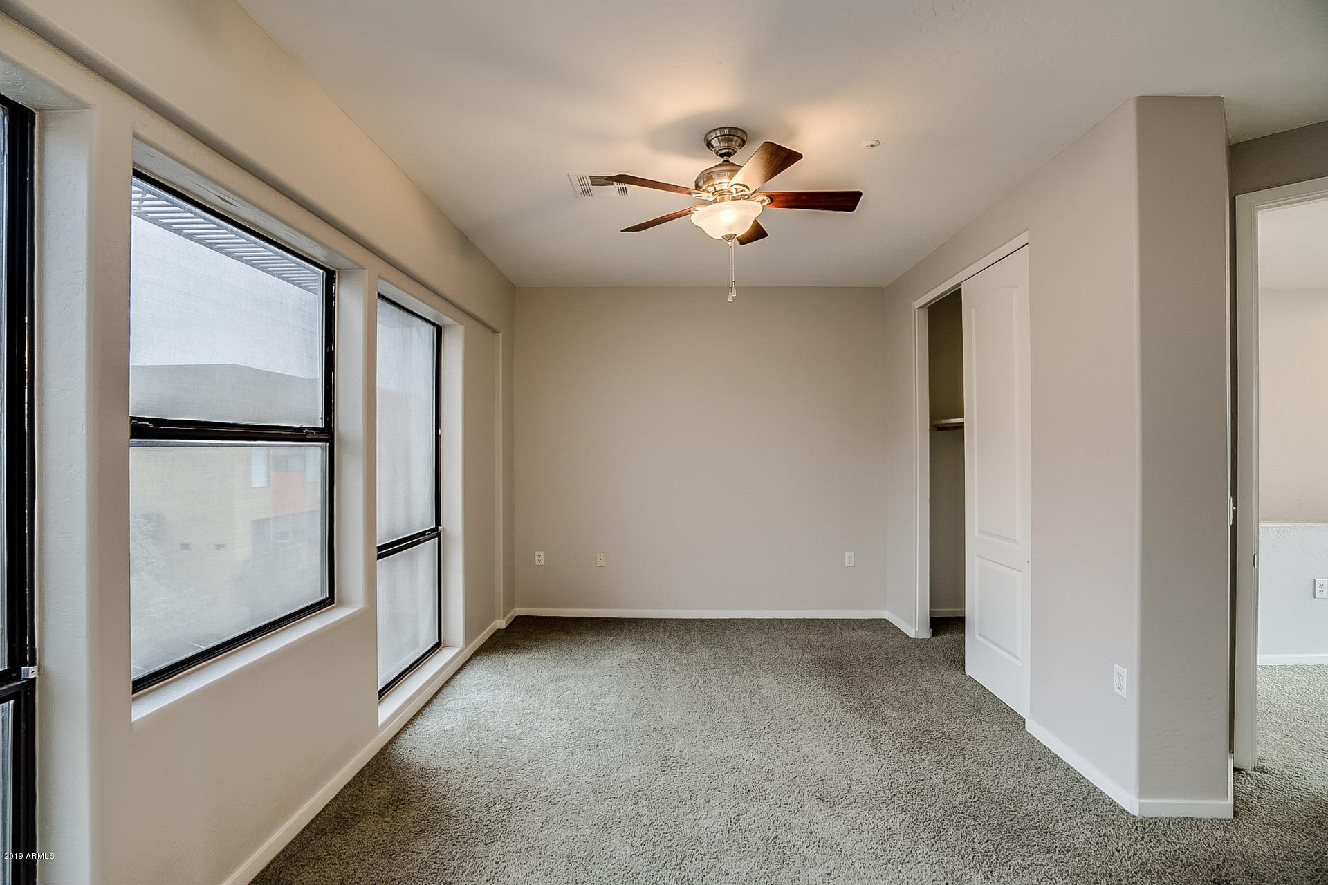 4746 East Culver Street Phoenix, AZ 85008 - Photo 11 of 13 a view of empty room with window