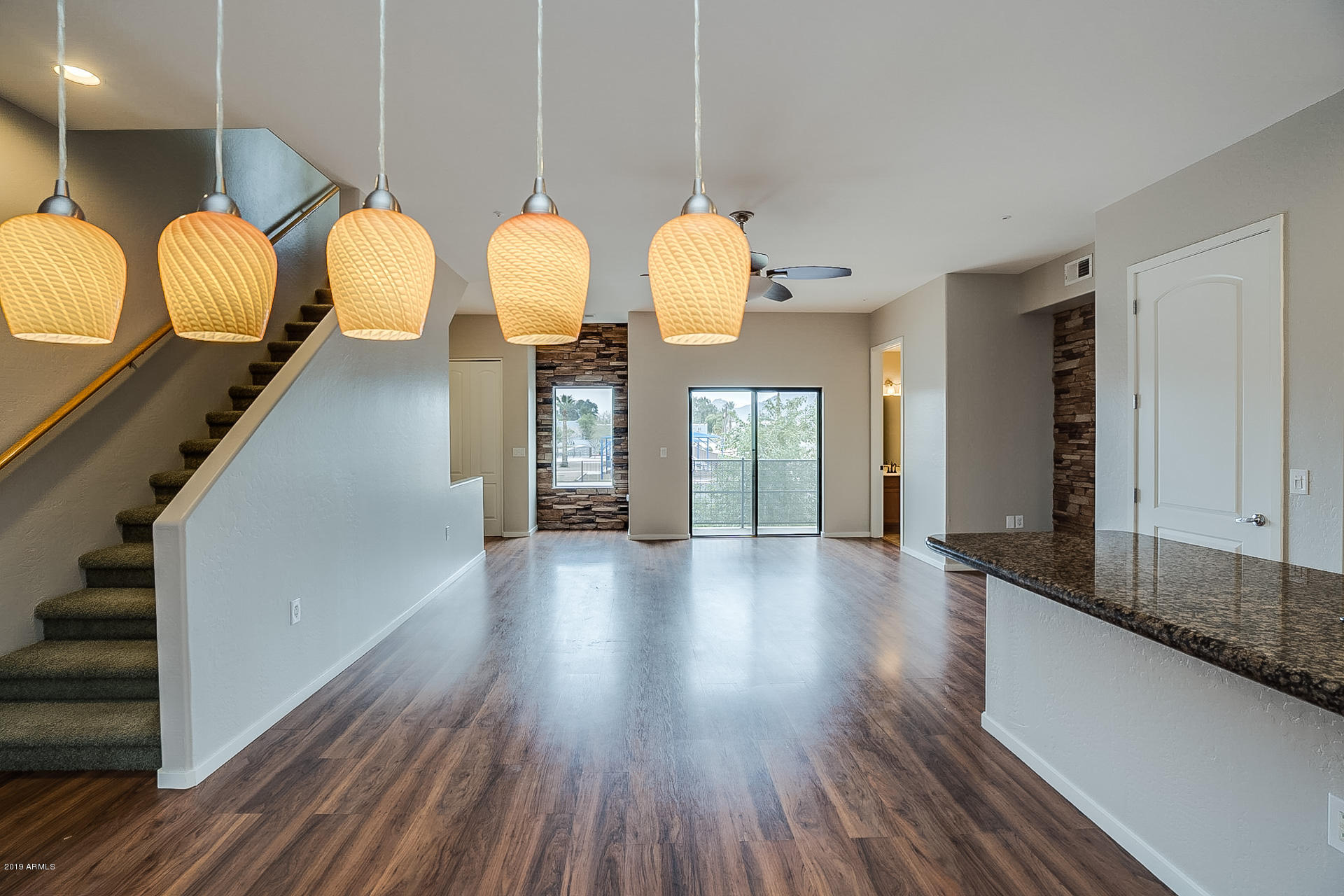 4746 East Culver Street Phoenix, AZ 85008 - Photo 7 of 13 a view of an entryway with wooden floor