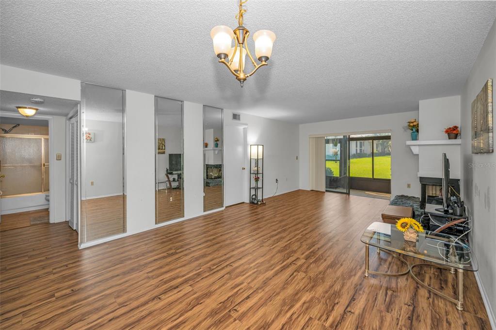 103 Lakeview Place, Unit 3 Oldsmar, FL 34677 - Photo 13 of 54 a view of a living room and dining room