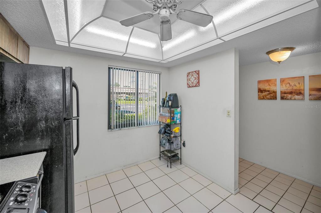 103 Lakeview Place, Unit 3 Oldsmar, FL 34677 - Photo 24 of 54 a view of empty room with window and ceiling fan