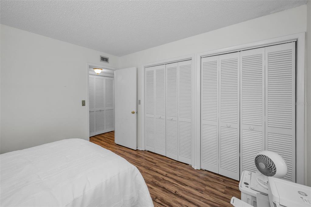 103 Lakeview Place, Unit 3 Oldsmar, FL 34677 - Photo 30 of 54 a bedroom with a bed and a window