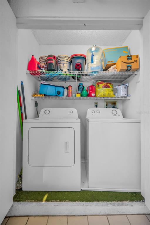 103 Lakeview Place, Unit 3 Oldsmar, FL 34677 - Photo 32 of 54 a utility room with dryer and washer