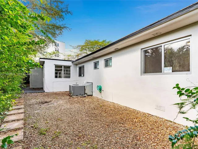 a house view with a outdoor space