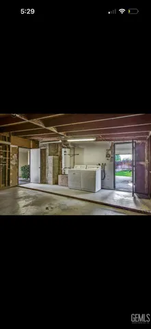 a kitchen with a sink and an oven