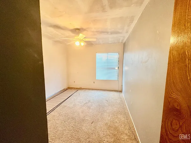 an empty room with a natural light