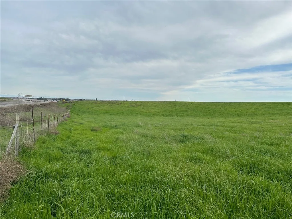 1 Billy Wright Road Los Banos, CA 93635 - Photo 12 of 23 a view of a lake with houses in the back