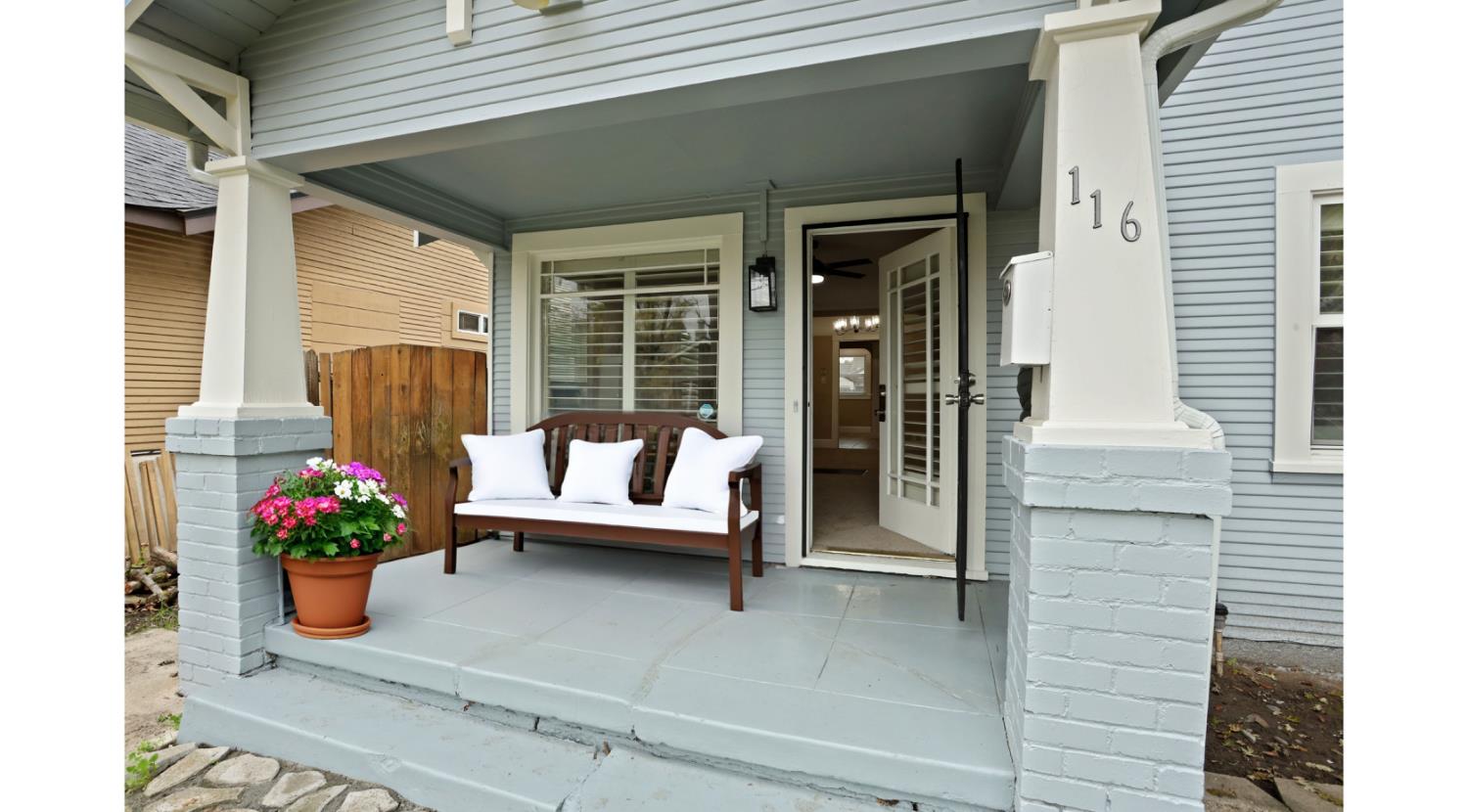 116 East Noble Street Stockton, CA 95204 - Photo 2 of 27 Covered front porch with AI decorated inspiration.