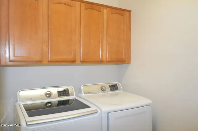 a bedroom with a bed and a ceiling fan