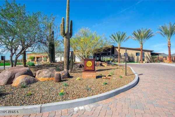 a dining hall with lots of tables and chairs