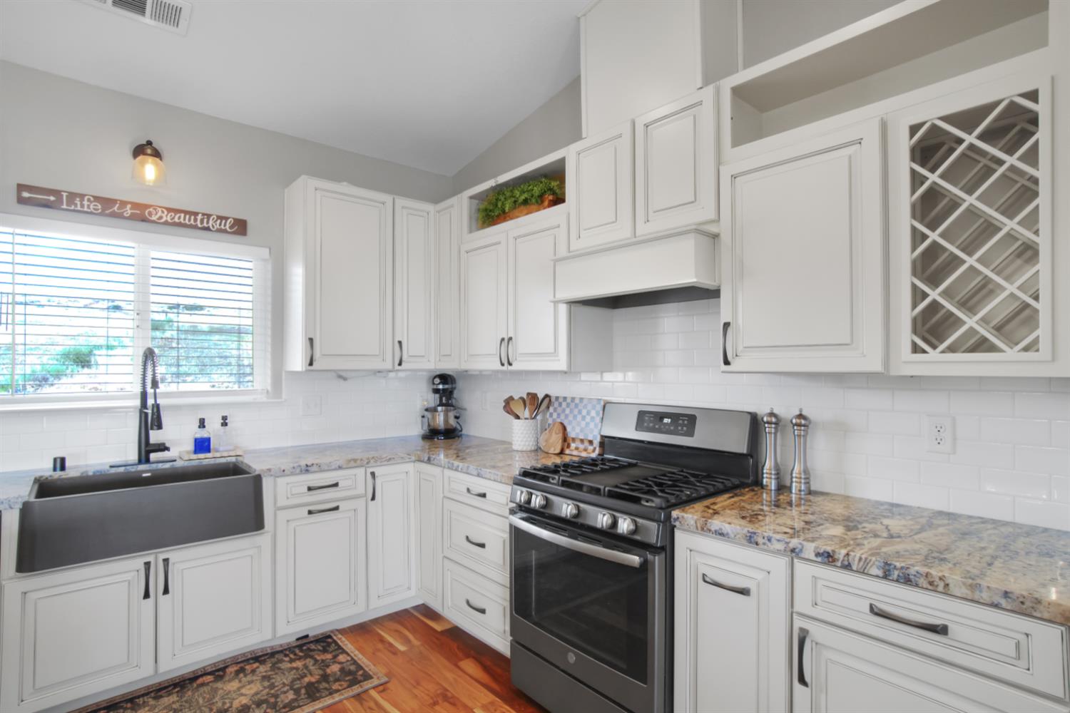 7991 South Shingle Road Shingle Springs, CA 95682 - Photo 7 of 58 a kitchen with cabinets appliances and a window