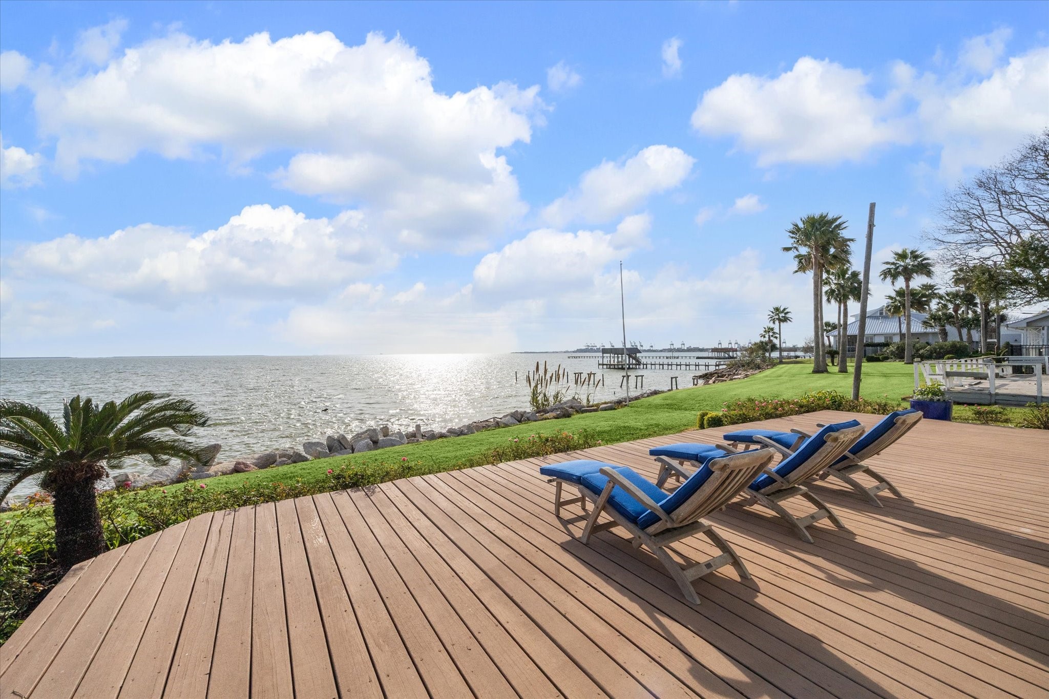 232 Garfield Street La Porte, TX 77571 - Photo 26 of 35 a view of swimming pool with lounge chair and wooden fence