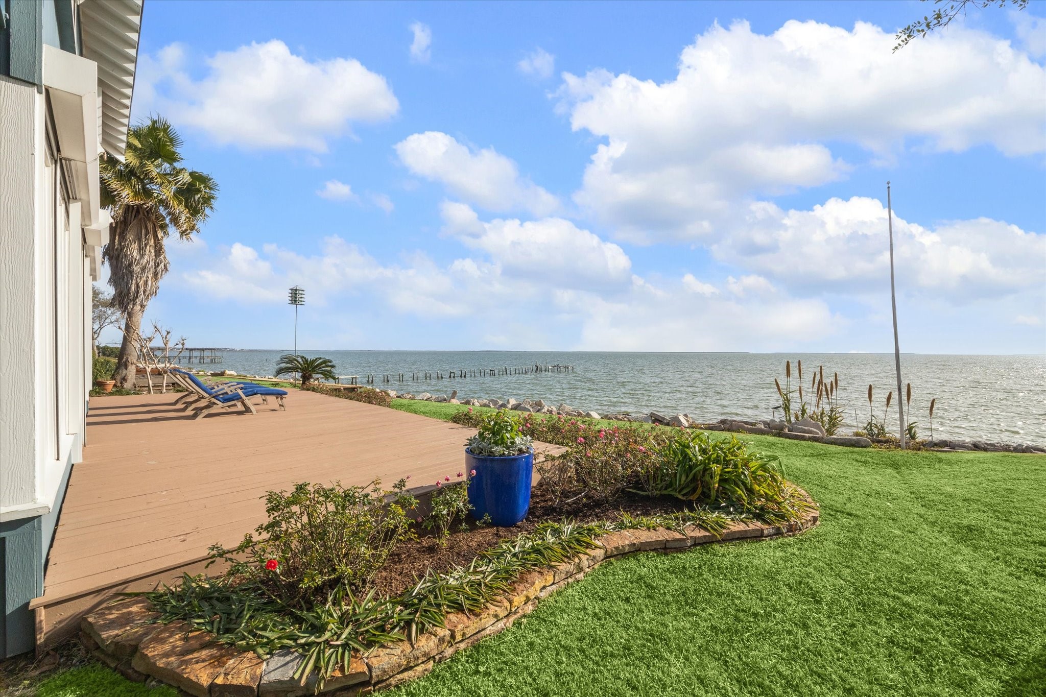 232 Garfield Street La Porte, TX 77571 - Photo 27 of 35 a view of a lake and a yard