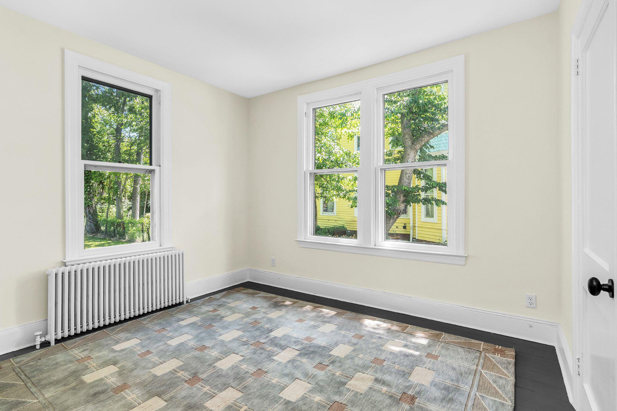 709 Church Street Cambridge, MD 21613 - Photo 21 of 36 an empty room with a window