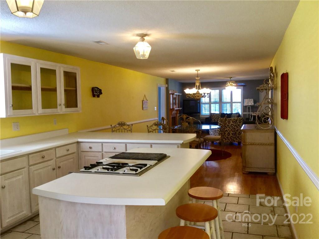 3371 Flat Creek Road Lancaster, SC 29720 - Photo 16 of 38 a kitchen with sink stove and cabinets