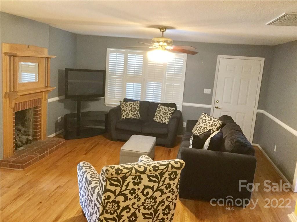 3371 Flat Creek Road Lancaster, SC 29720 - Photo 18 of 38 a living room with furniture window and a flat screen tv