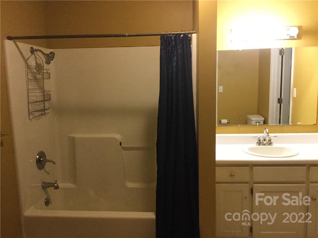 3371 Flat Creek Road Lancaster, SC 29720 - Photo 25 of 38 a bathroom with a shower and a sink