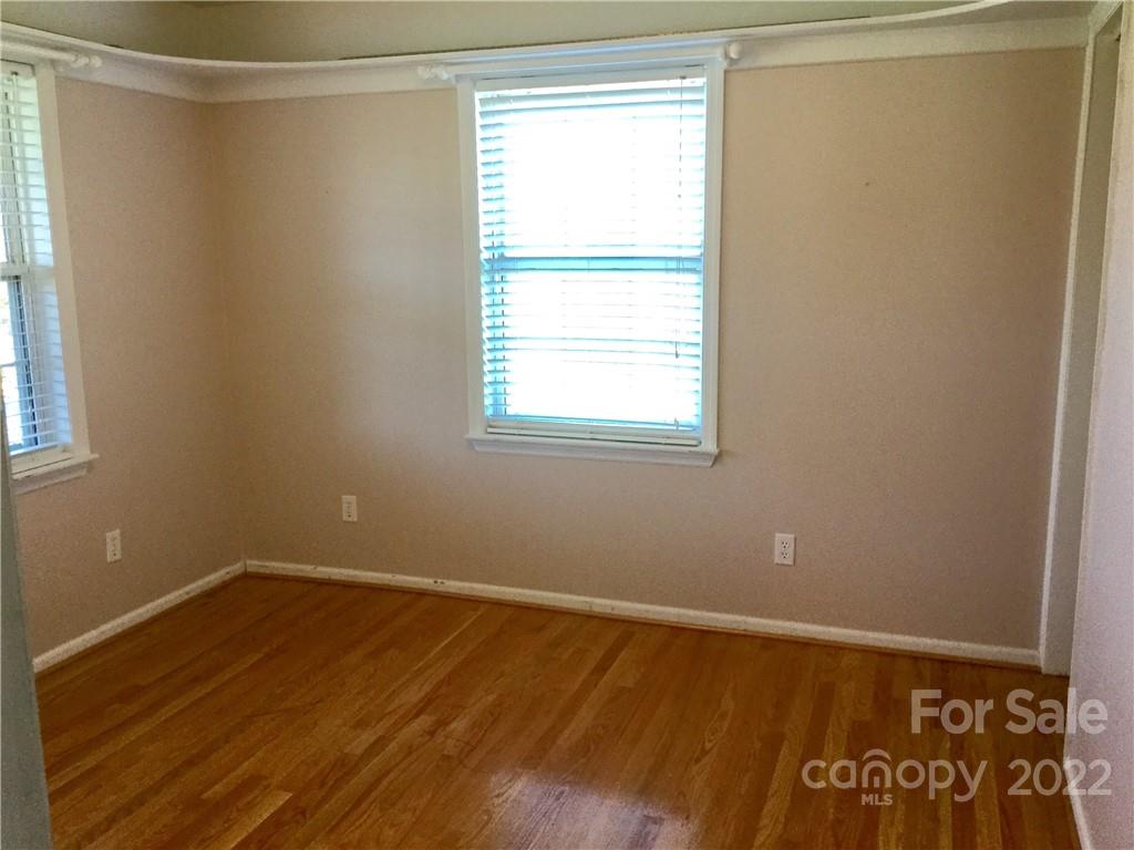 3371 Flat Creek Road Lancaster, SC 29720 - Photo 31 of 38 a view of a room with wooden floor and windows