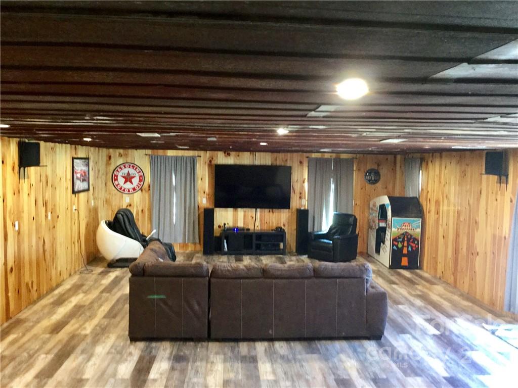 3371 Flat Creek Road Lancaster, SC 29720 - Photo 34 of 38 a living room with furniture and a flat screen tv
