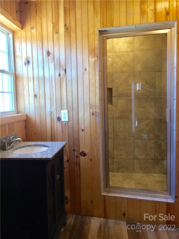 3371 Flat Creek Road Lancaster, SC 29720 - Photo 36 of 38 a bathroom with a sink and a mirror