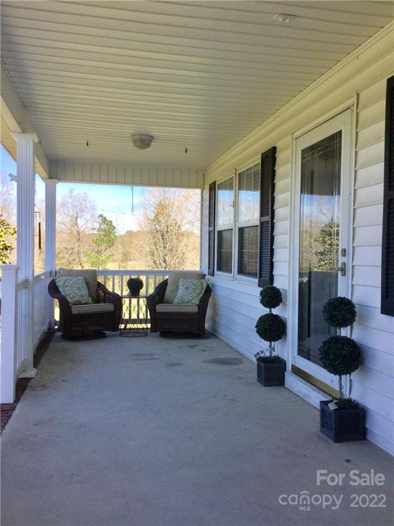 3371 Flat Creek Road Lancaster, SC 29720 - Photo 5 of 38 a living room with furniture and a large window