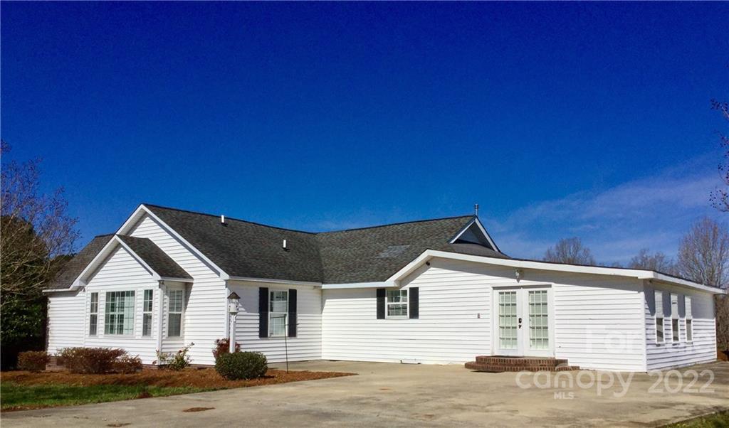 3371 Flat Creek Road Lancaster, SC 29720 - Photo 6 of 38 a front view of a house with a yard