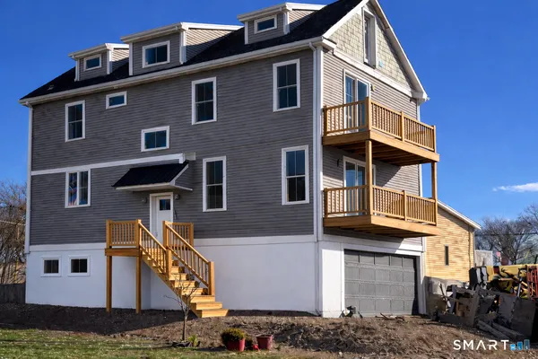 a front view of a house with balcony