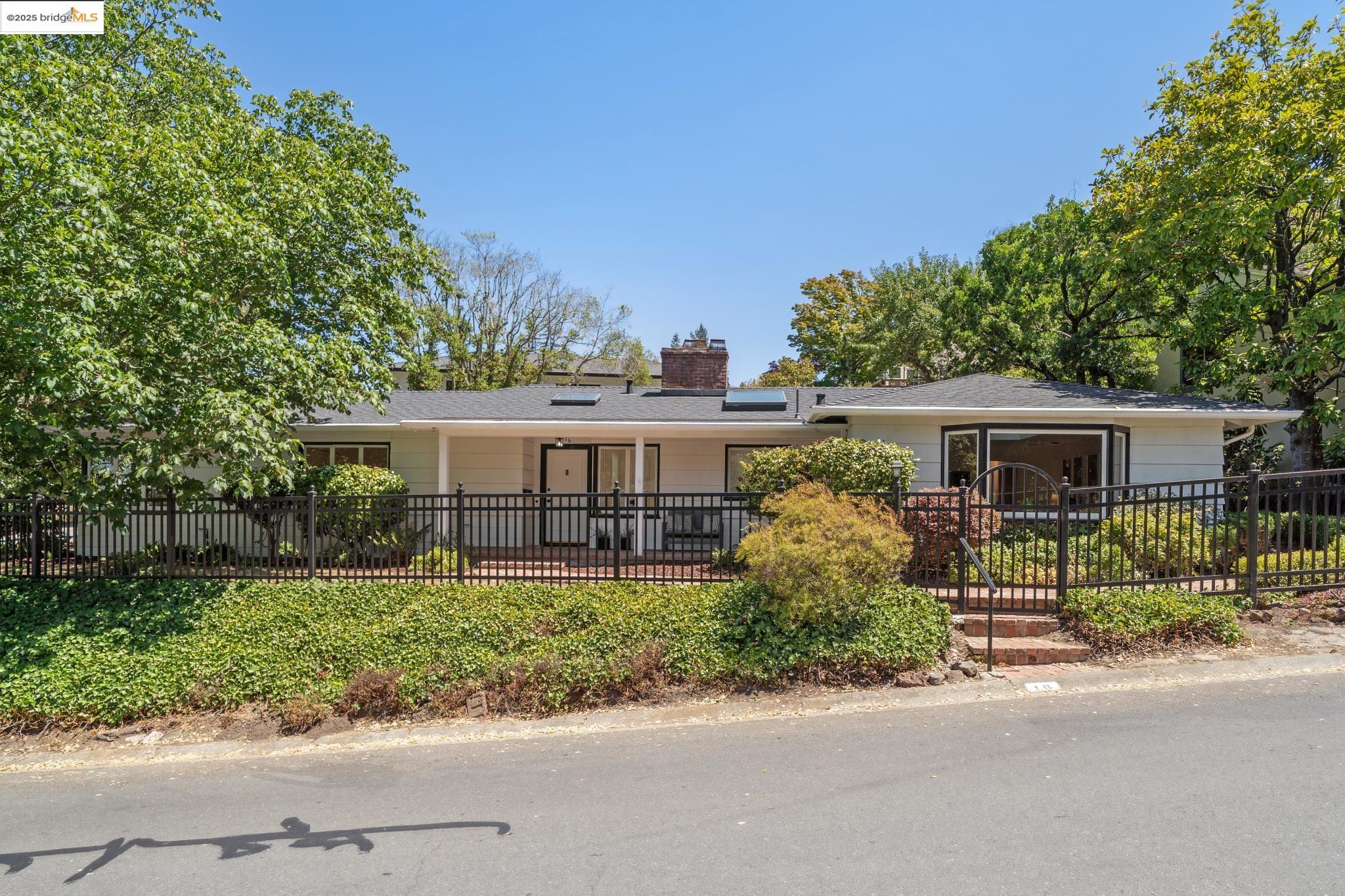 front view of a house with a street