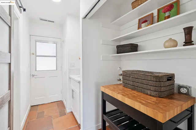 a view of small space with racks on the wall
