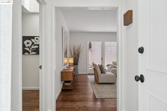 a living room with furniture and a gate
