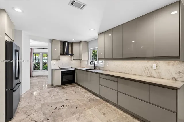 a view of a room with shelf on the wall