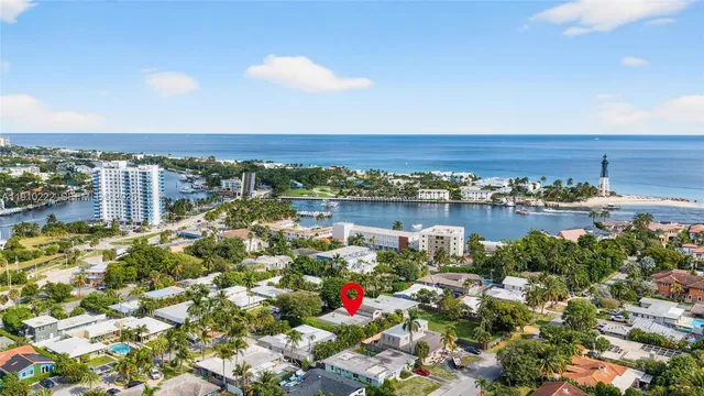 a living room with fireplace furniture and decor