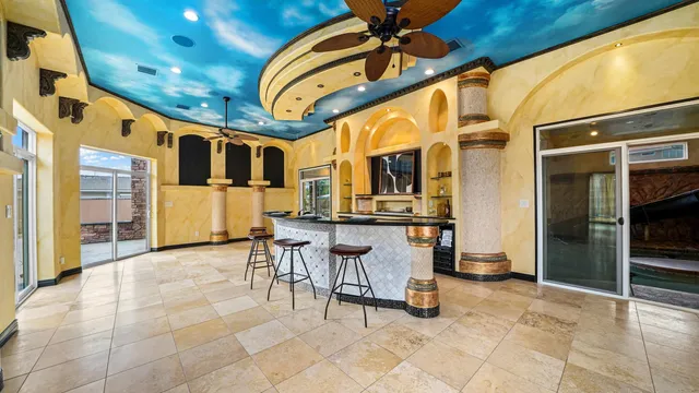 a view of an chairs and tables in the patio