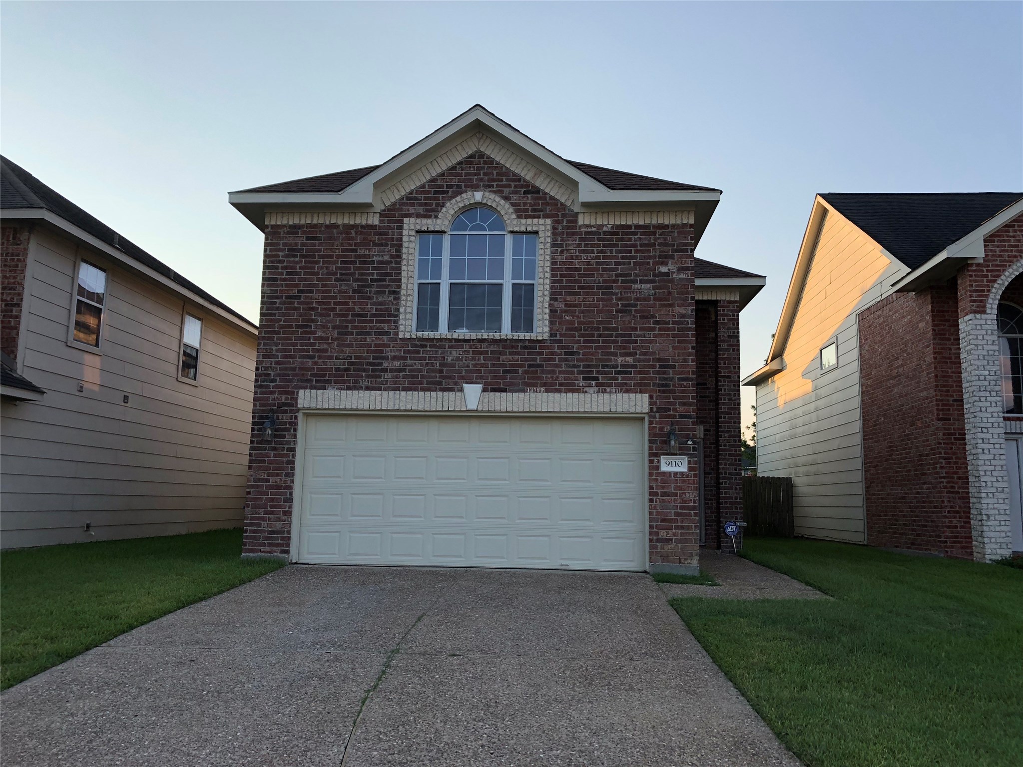 9110 Prairie Trails Drive Spring, TX 77379 - Photo 1 of 34 a front view of a house with a garden and garage