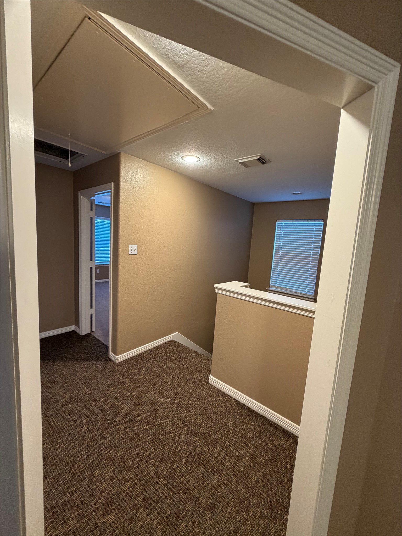 9110 Prairie Trails Drive Spring, TX 77379 - Photo 11 of 34 a view of livingroom with a hallway