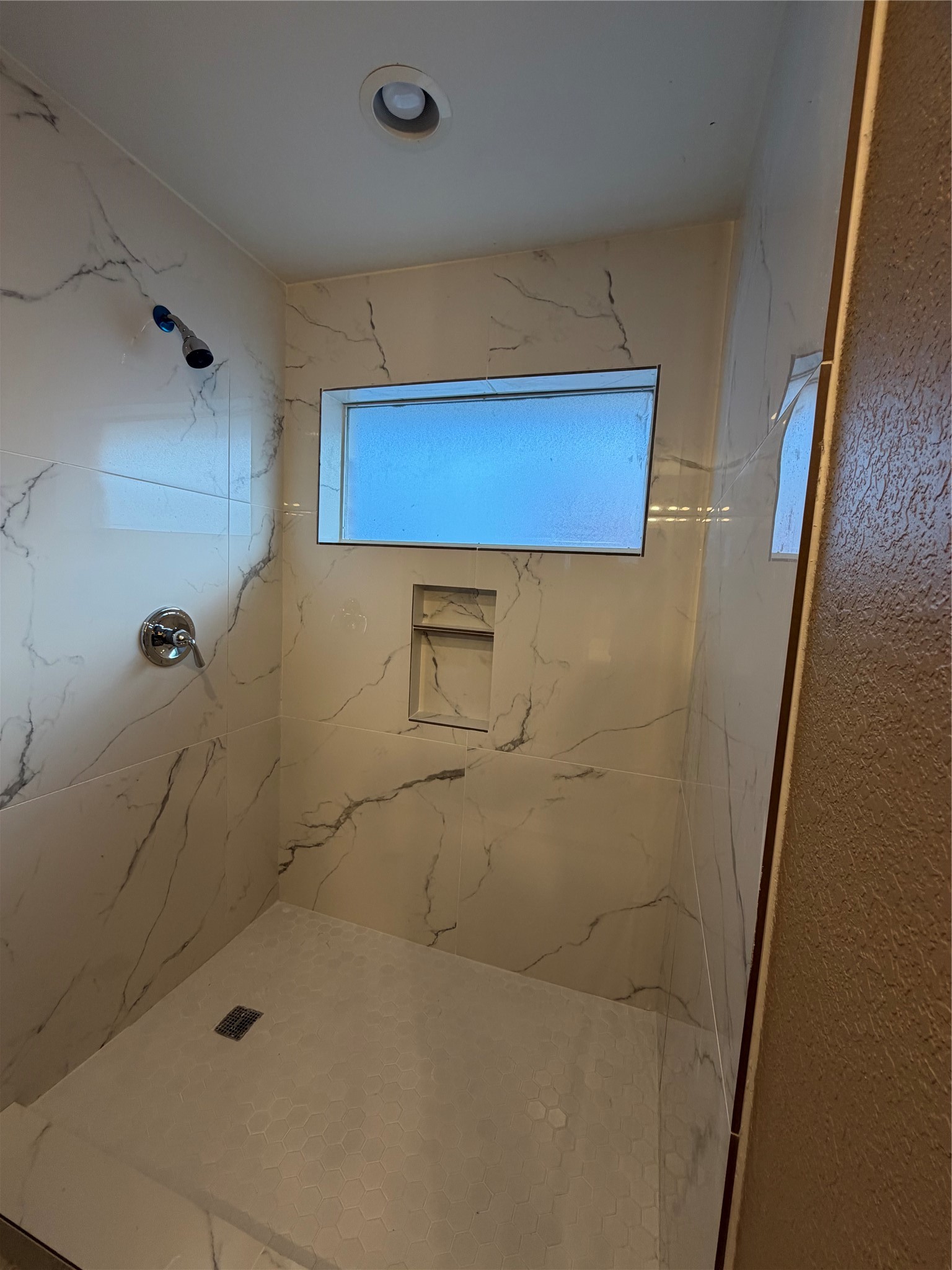 9110 Prairie Trails Drive Spring, TX 77379 - Photo 16 of 34 a bathroom with a shower