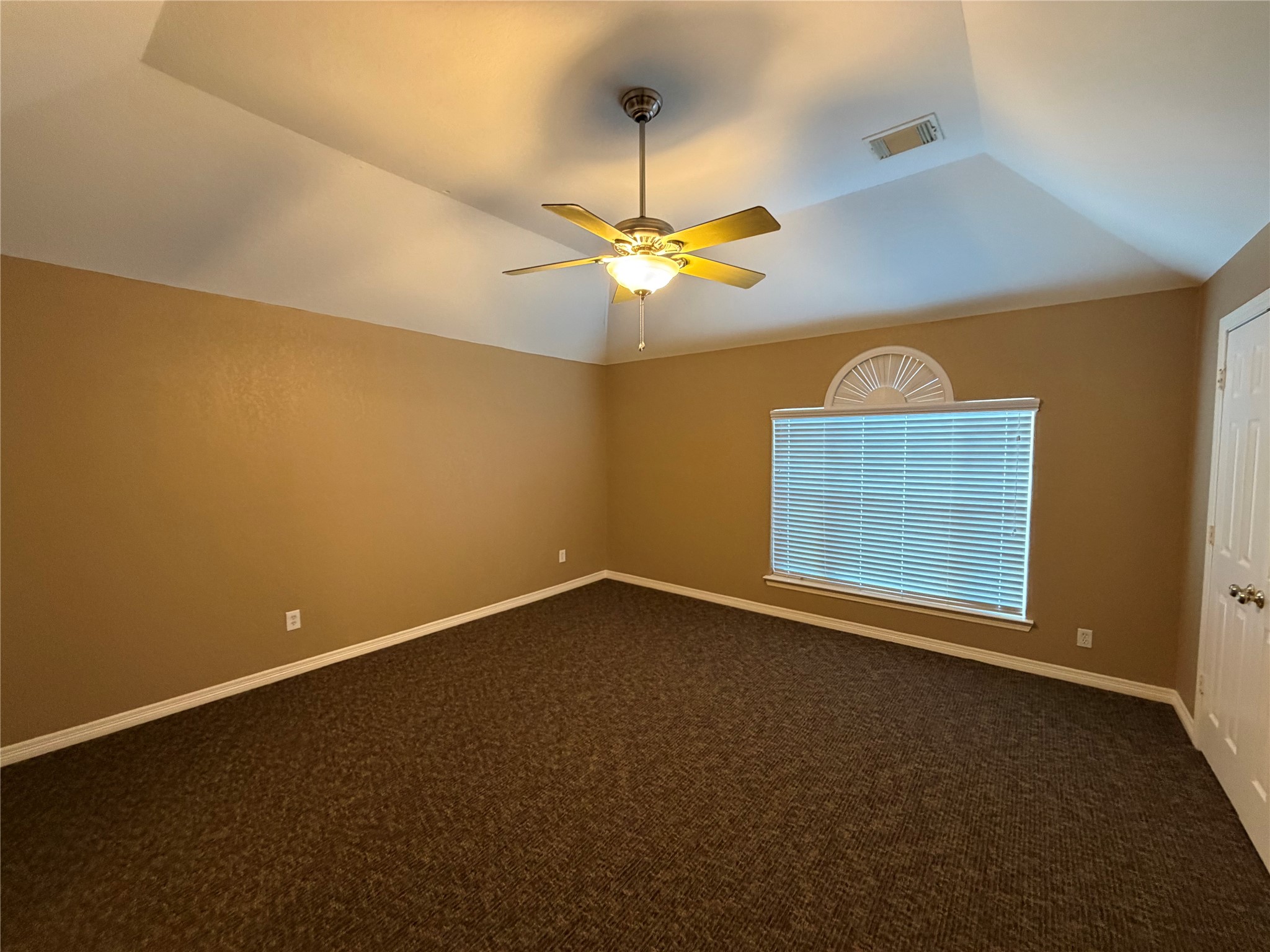 9110 Prairie Trails Drive Spring, TX 77379 - Photo 17 of 34 a view of an empty room with a window