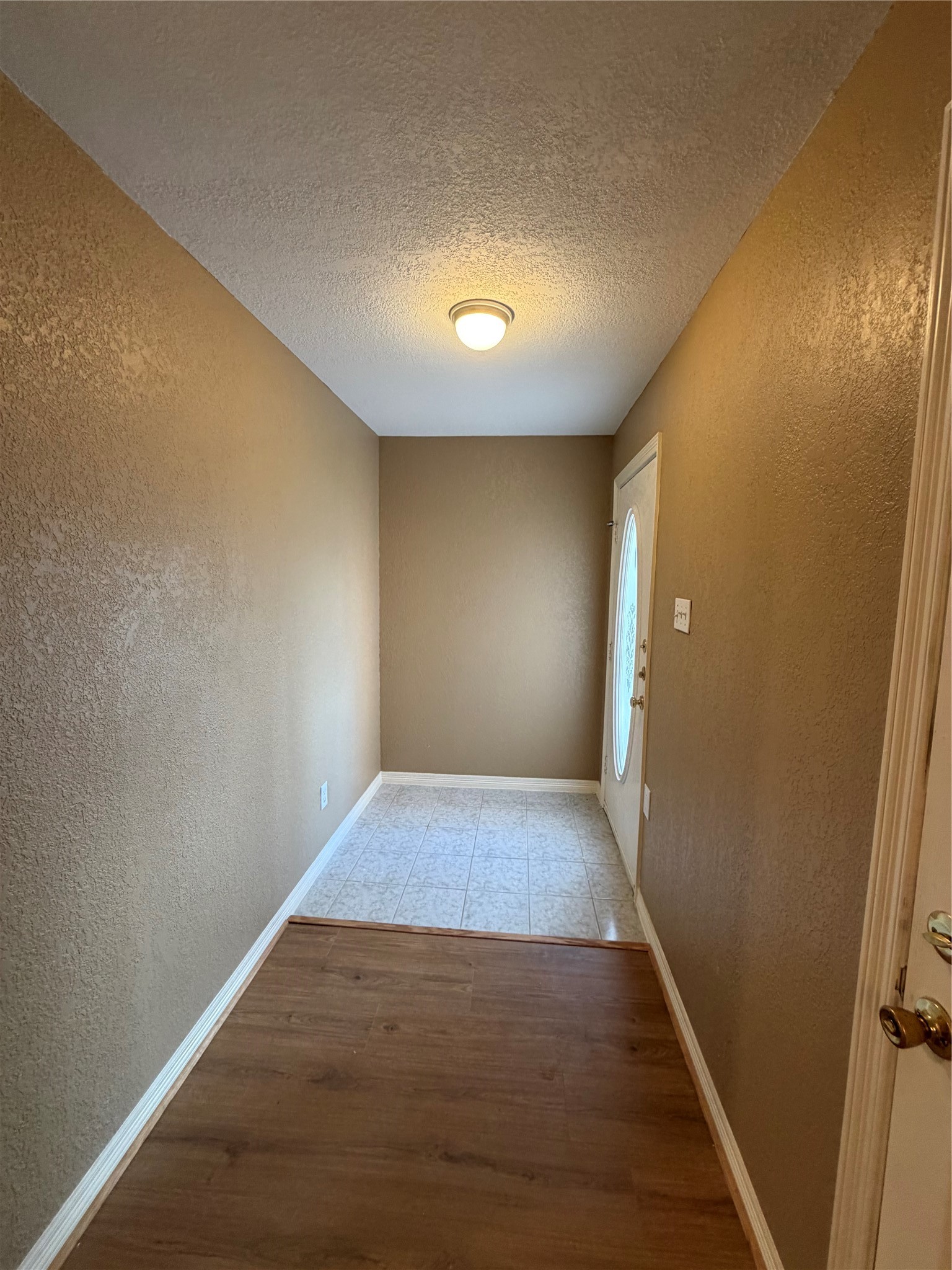 9110 Prairie Trails Drive Spring, TX 77379 - Photo 26 of 34 a view of hallway with wooden floor