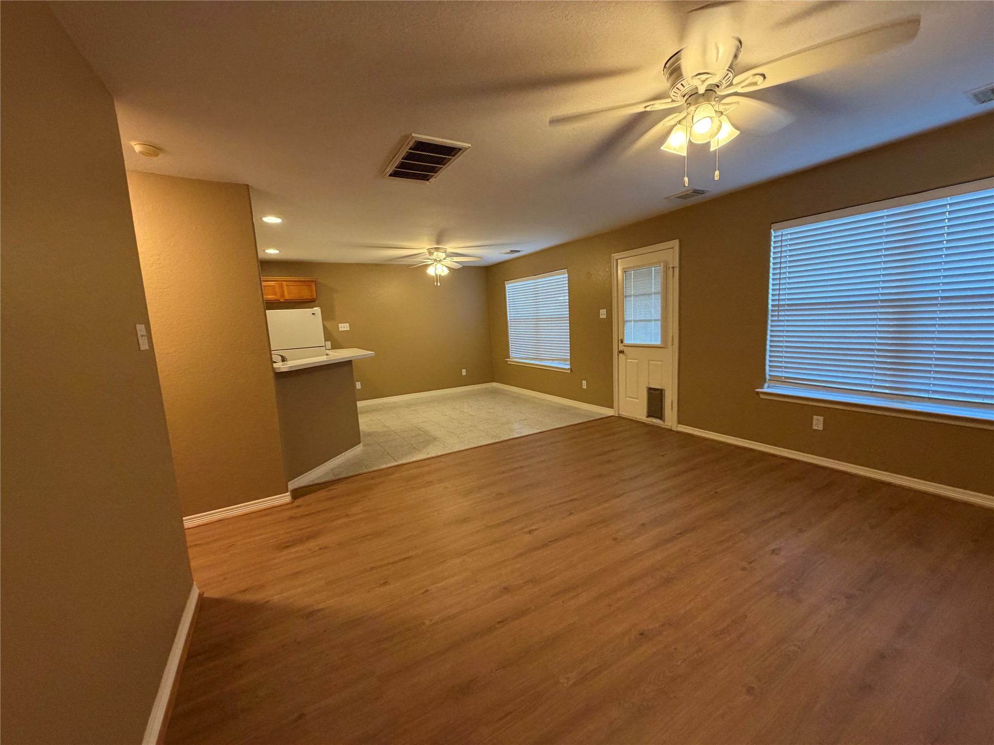 9110 Prairie Trails Drive Spring, TX 77379 - Photo 33 of 34 a view of empty room with window and ceiling fan