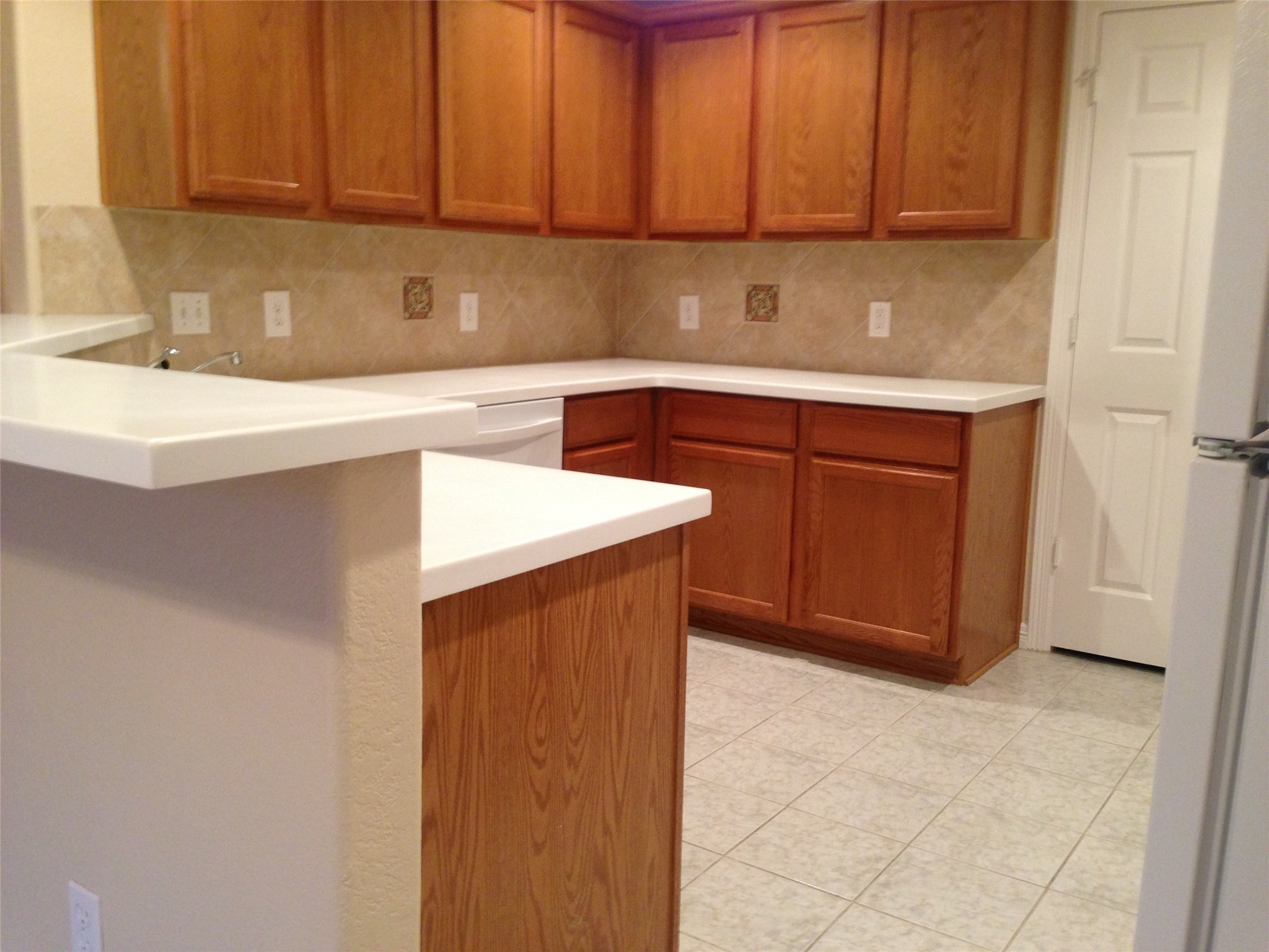9110 Prairie Trails Drive Spring, TX 77379 - Photo 4 of 34 a kitchen with stainless steel appliances a sink cabinets and a counter top space
