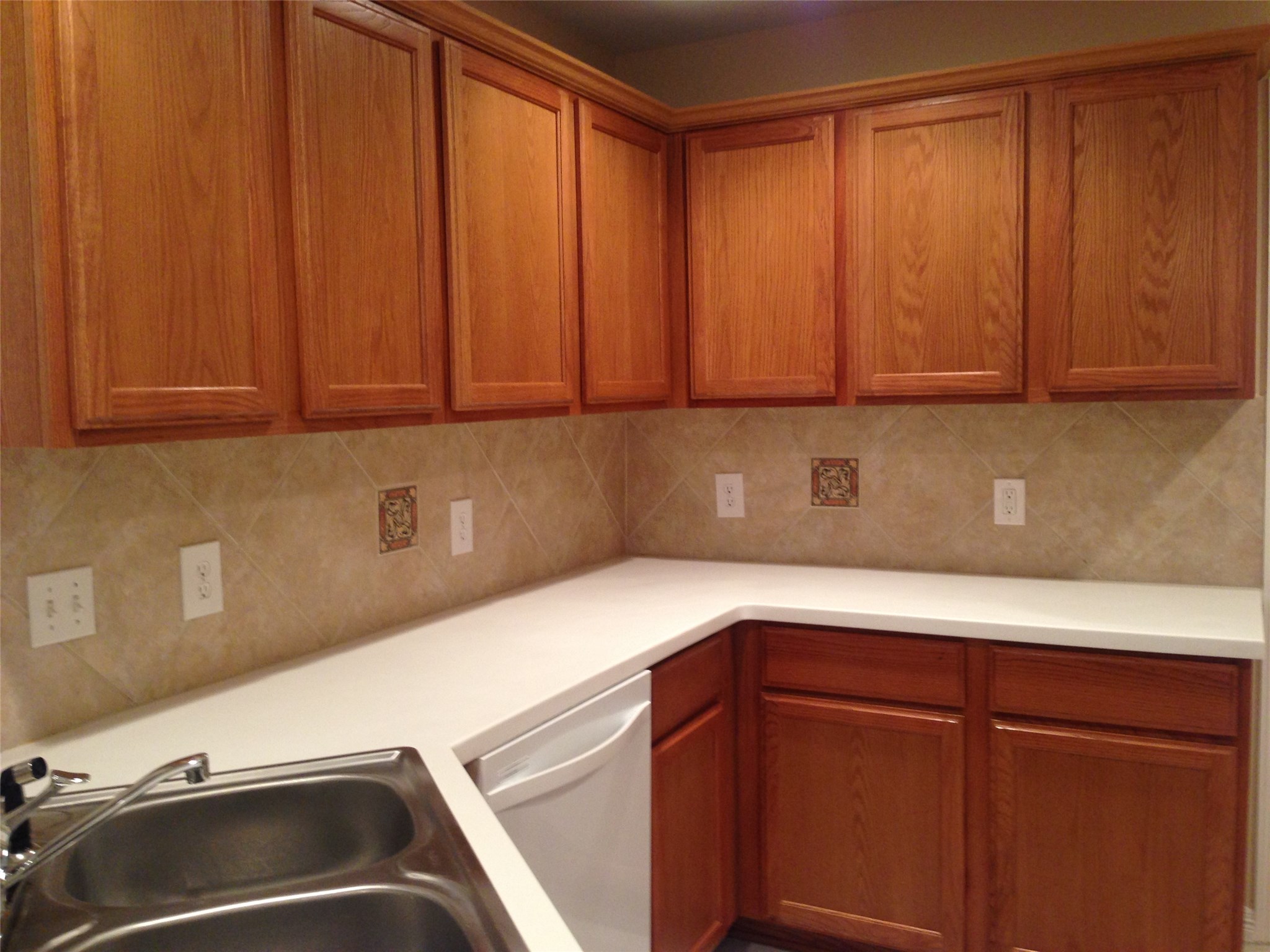 9110 Prairie Trails Drive Spring, TX 77379 - Photo 6 of 34 a kitchen with a sink and cabinets