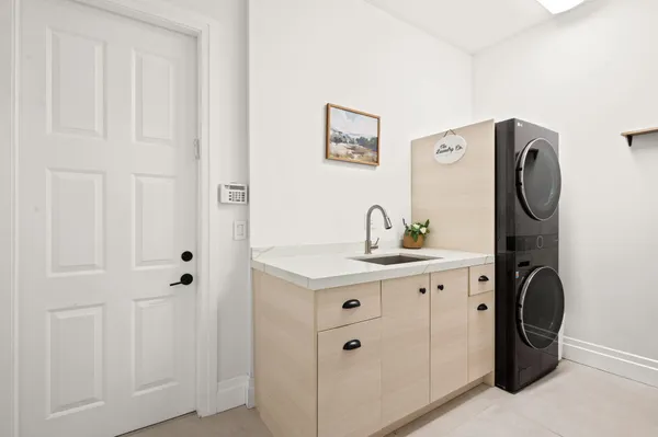 a view of a hallway with washer and dryer